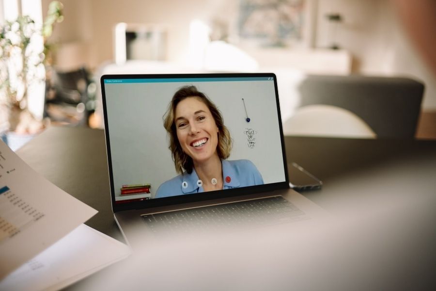 video call on laptop with female tech expert